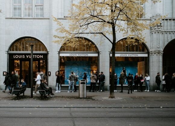 Exploring Zurich's Fashion Scene: Hidden Gems and Trendsetters people walking on sidewalk near building during daytime