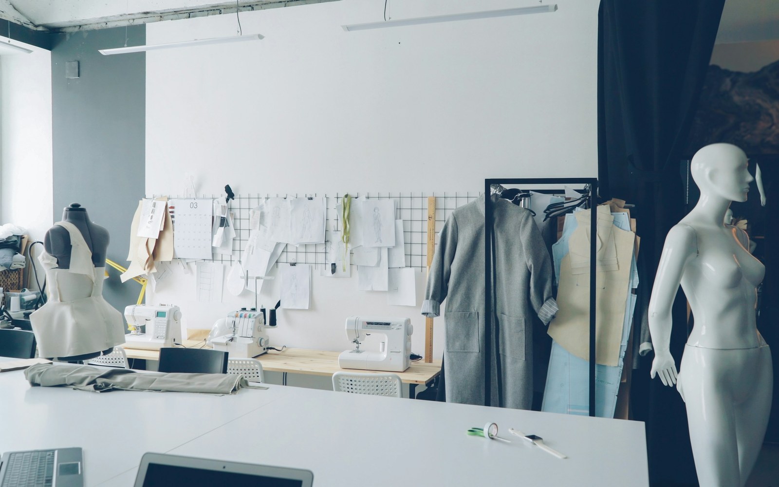 Zurich fashion designers atelier with mannequins and sewing materials