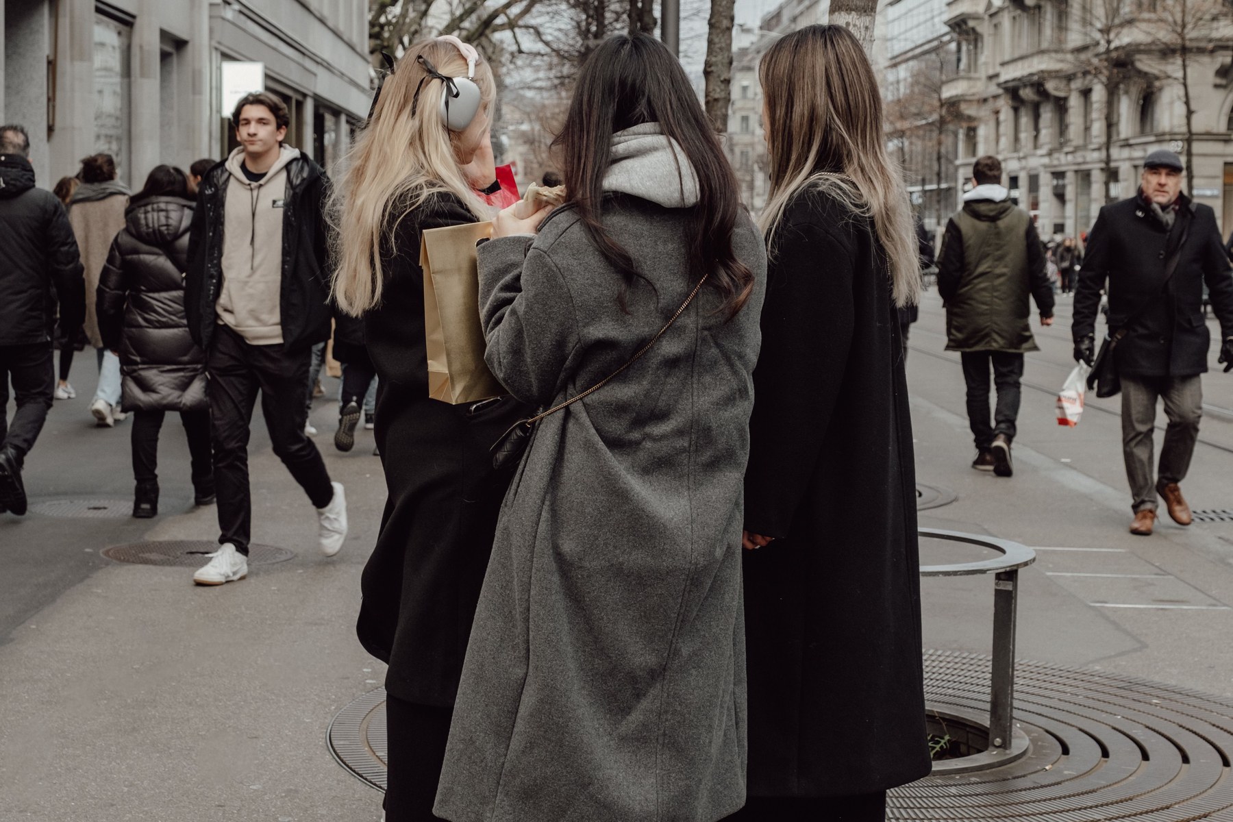 Zurich fashion scene street style with winter coats near Bahnhofstrasse