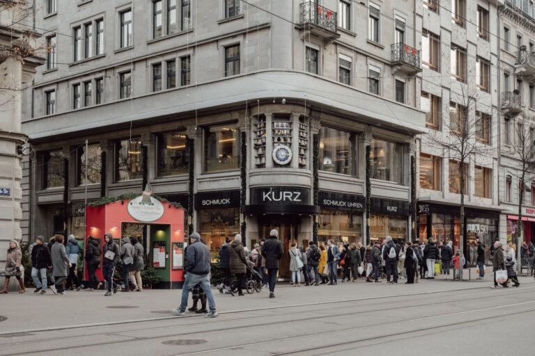 Zurich vs Geneva style comparison with Bahnhofstrasse jewellery store, city coats and Swiss luxury shopping street
