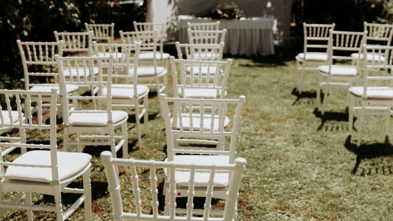 Swiss wedding dress code setting: rows of guest chairs at an outdoor garden ceremony