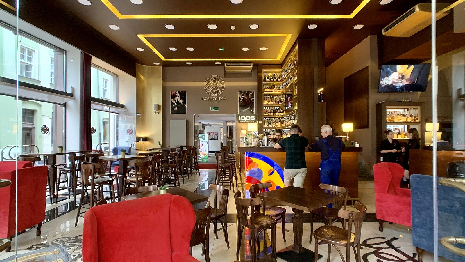 Warmly lit bar interior representing the bar and social side of ZÜRI BROCKI NIGHTS