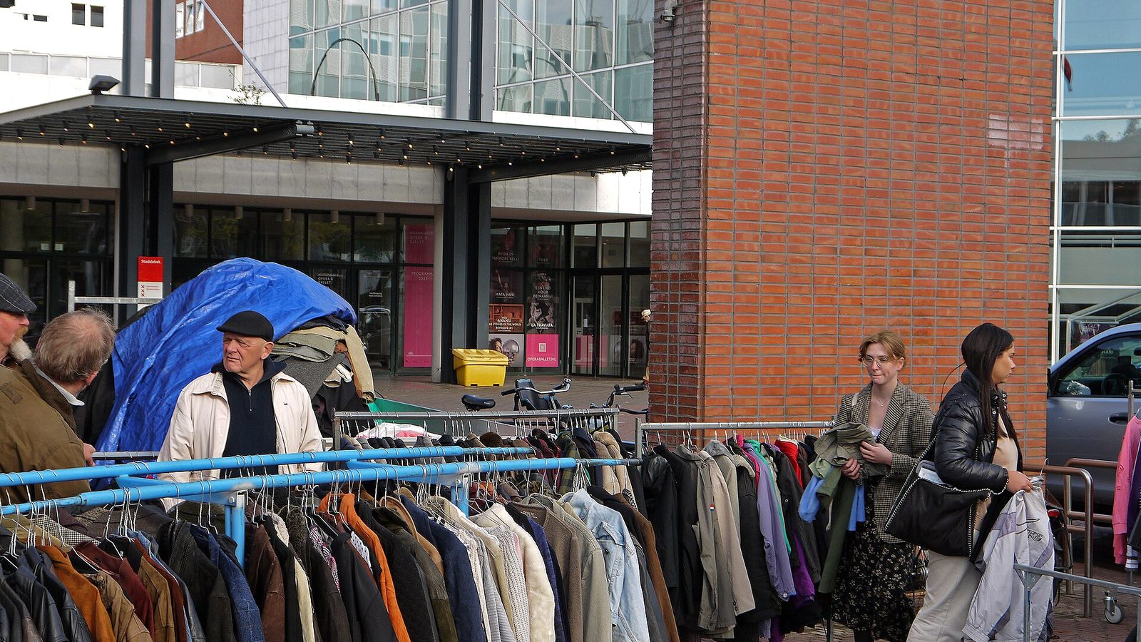 Racks of second-hand clothes of the kind shoppers browse at ZÜRI BROCKI NIGHTS in Zurich